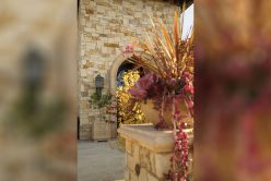 entrance to home with cottage cream traditional thin veneer installed on exterior