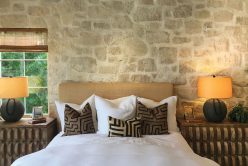 bedroom with Regent Buff Rubble thin veneer installed on interior wall