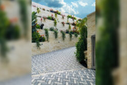 Camilla Neo Ledge: Sawn natural stone thin veneer installed on exterior wall of custom home entryway.