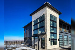 Stella Neo Ledge: Split natural stone thin veneer installed on exterior of custom home.