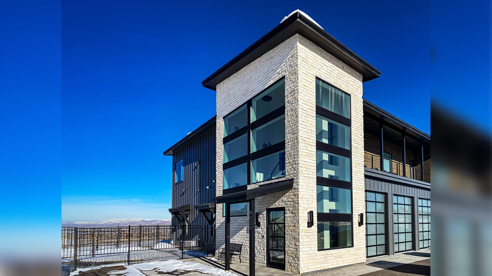 Stella Neo Ledge: Split natural stone thin veneer installed on exterior of custom home.