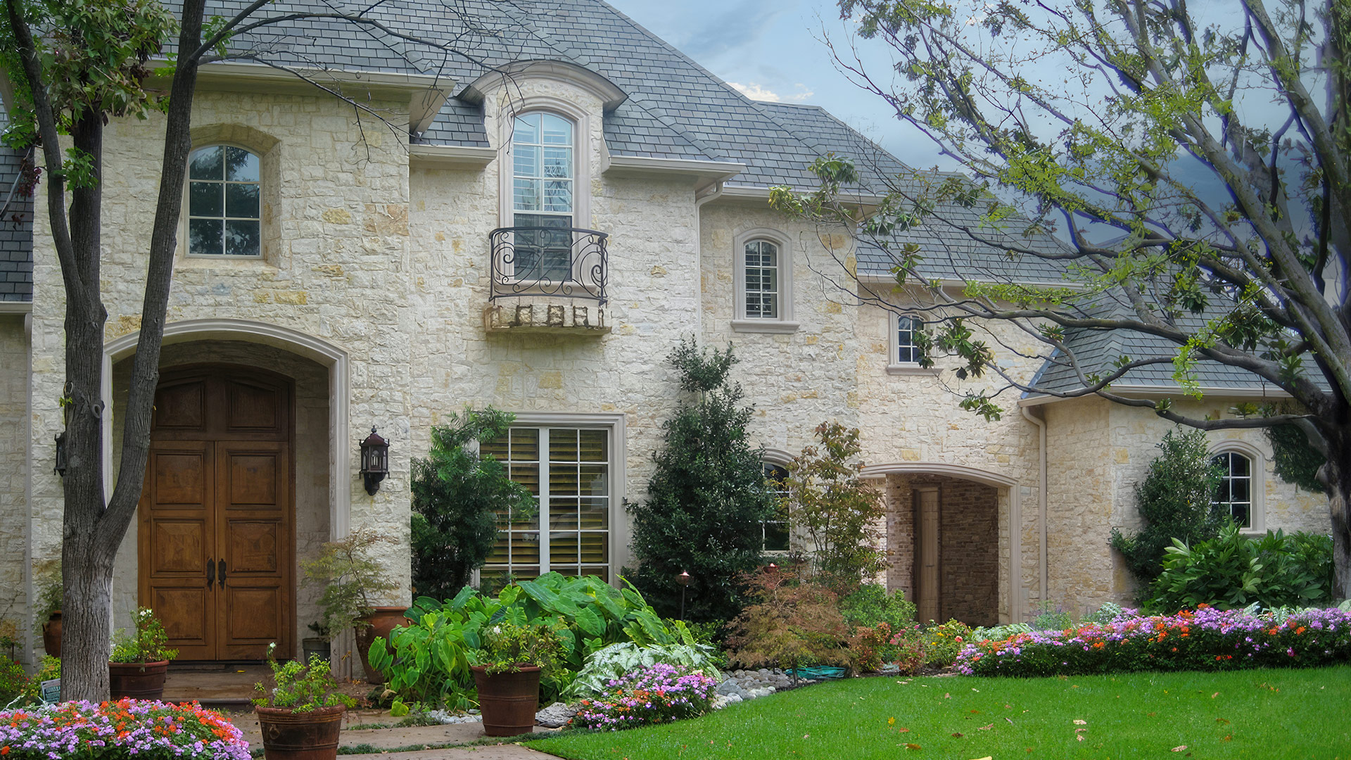 Camilla Recs natural stone thin veneer installed on exterior of home.