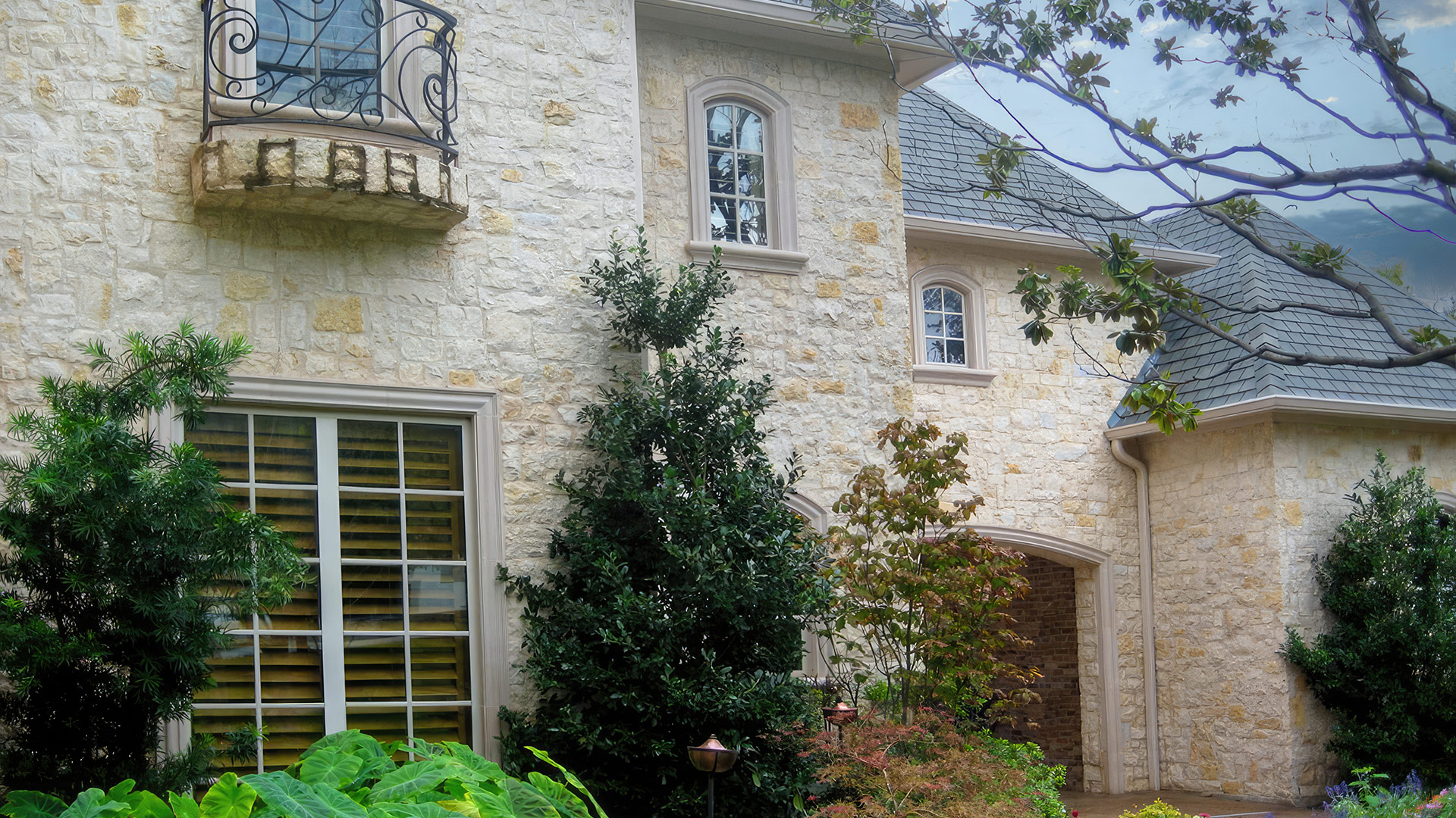 Camilla Recs natural stone thin veneer installed on exterior of home.