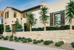Rhinestone Rubble with Overgrout installed on exterior walls of custom home.
