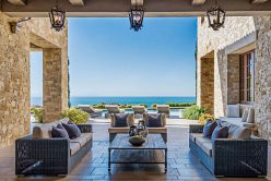 exterior seating area with ocean view Tuscan Blend Rubble thin veneer installed on exterior walls
