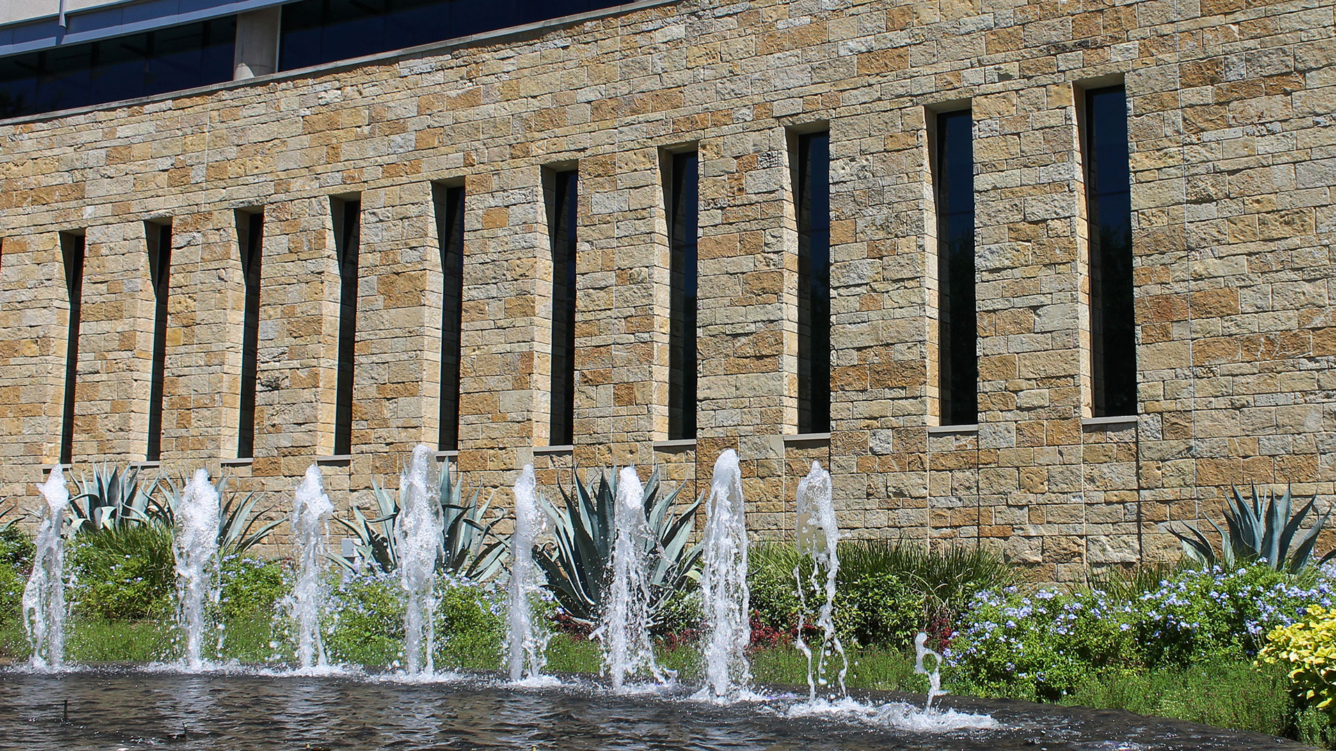 front of commercial building with archaic traditional thin veneer installed on exterior walls