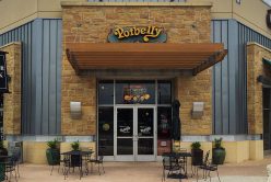 front of commercial restaurant with copper canyon thin veneer installed around door and windows