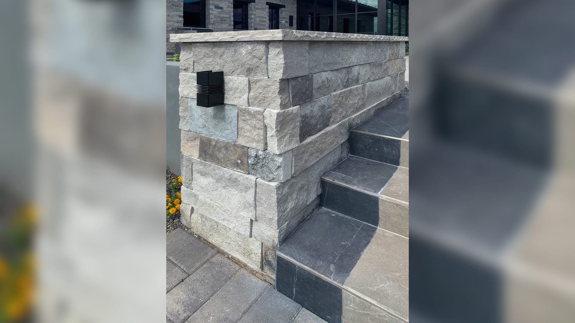 Mission Blue Traditional natural stone thin veneer installed on exterior of custom home.