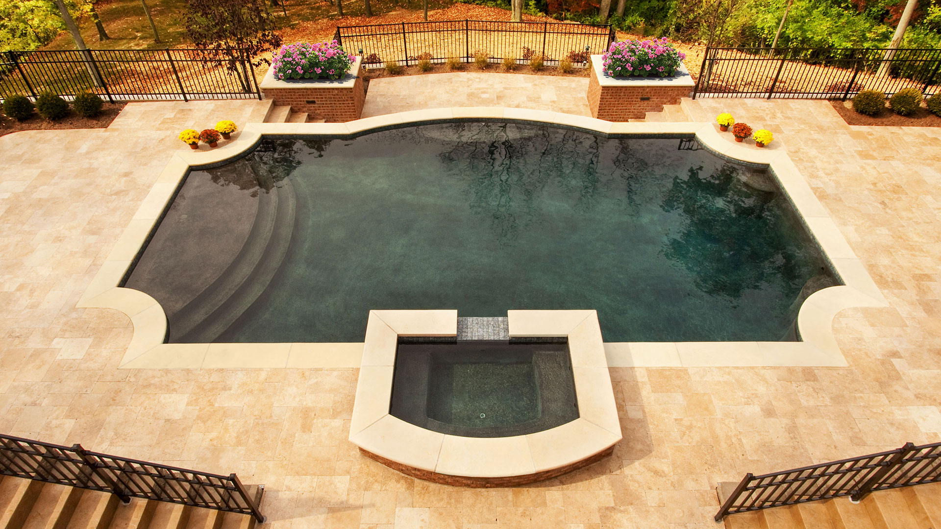 overlooking pool with Van Buren travertine installed around pool.