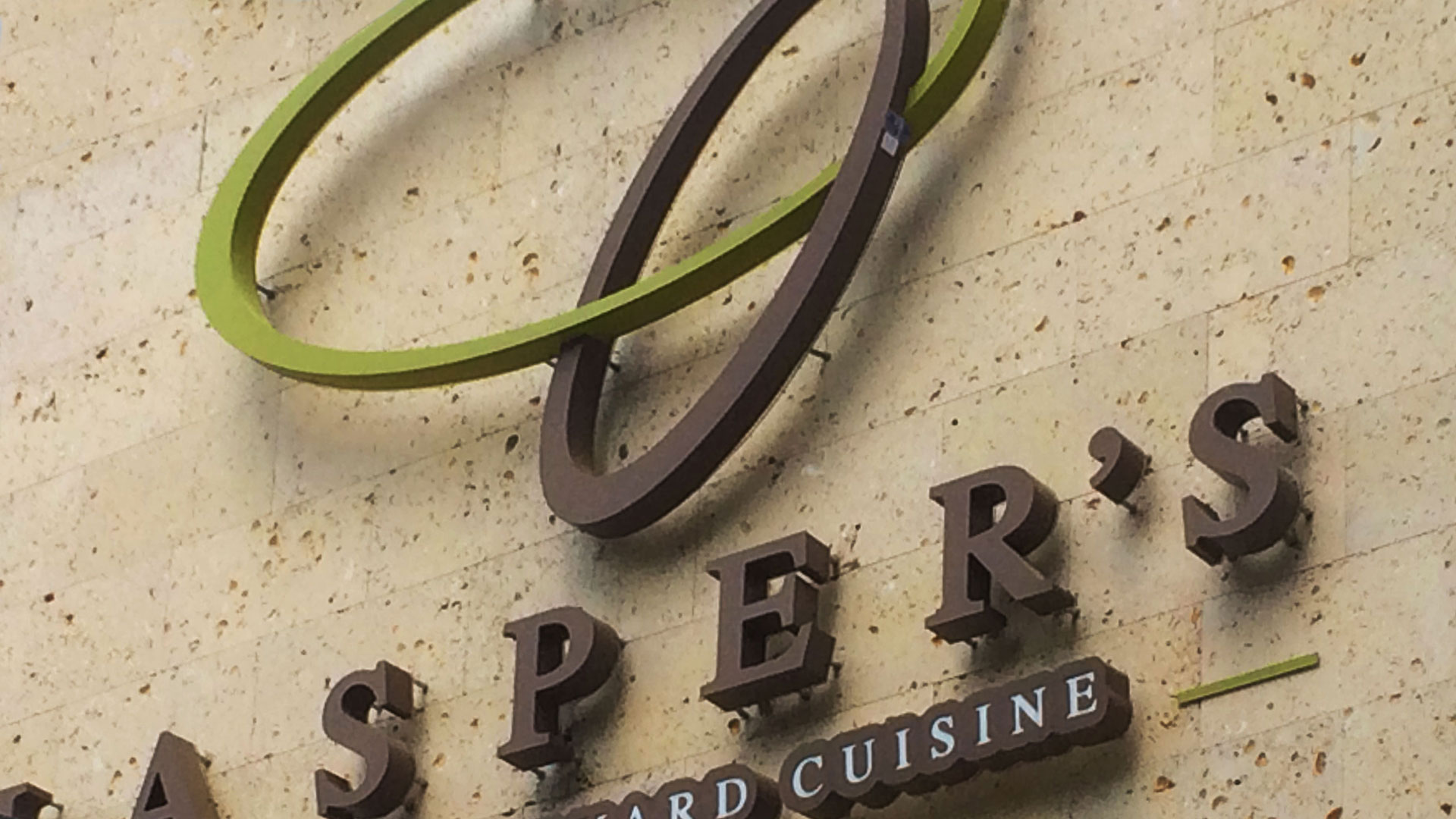 front of build with Texas Shell architectural cut stone custom profile natural stone installed on exterior walls