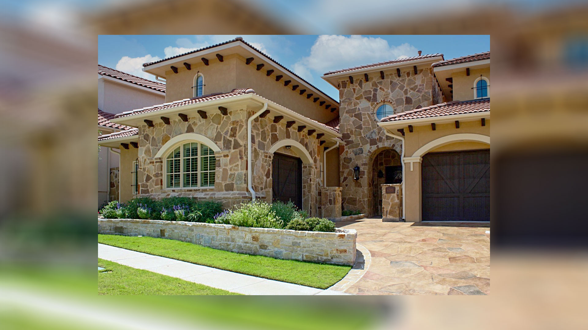 ashwood rubble custom profile natural stone thin veneer installed on exterior of home