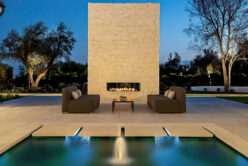 Blanco Rubble natural stone thin veneer with Mortar wash installed on exterior walls of home.