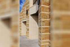 cream custom architectural cut stone installed on exterior of church