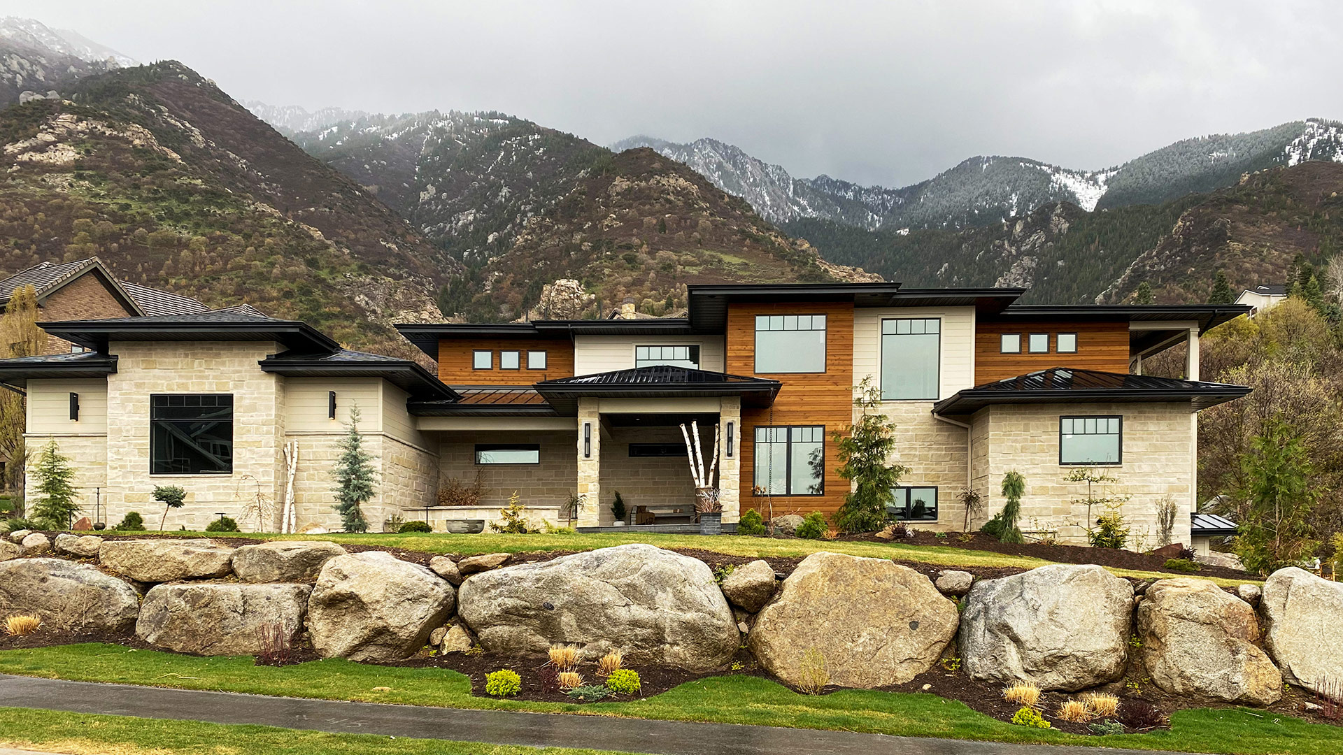 Nadia Neo Ledge: Split natural stone thin veneer installed on exterior of custom home.