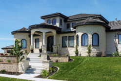 Cream Traditional natural stone thin veneer installed on custom home.