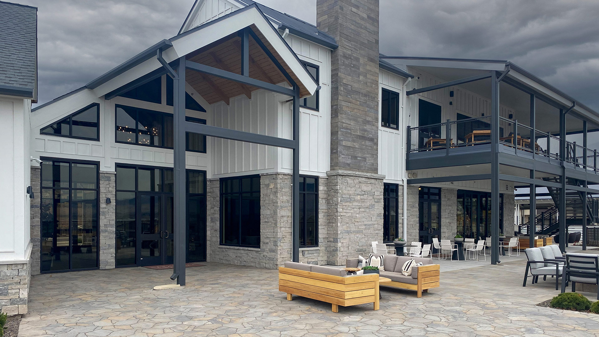 Mission Blue Traditional natural stone thin veneer installed on exterior walls of commercial building.