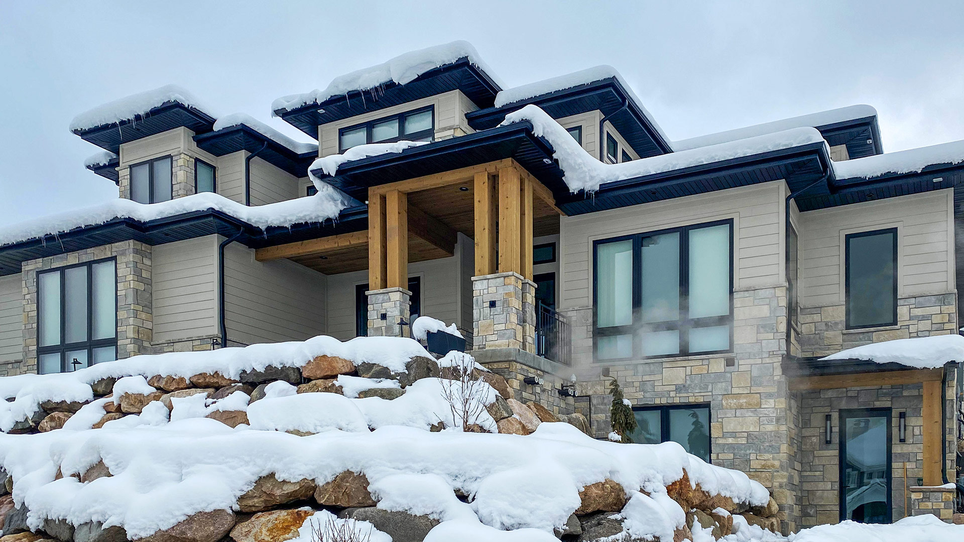 Tahoe Traditional natural stone thin veneer installed on exterior of custom home.